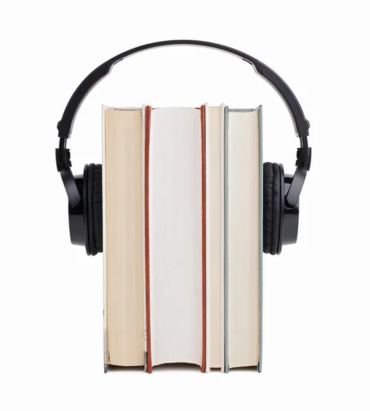 Headphones put on a few books — Stock Photo, Image