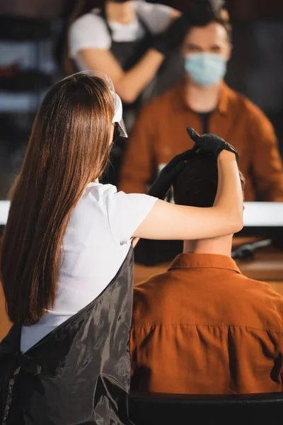 Hairstylist Apron Latex Gloves Touching Hair Man Medical Mask Blurred — Stock Photo, Image