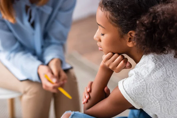 Close Upset African American Girl Closed Eye Psychologist Consultation Blurred — Stock Photo, Image