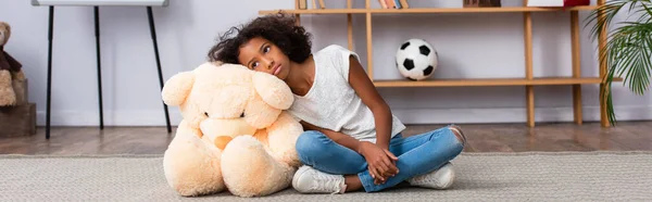 Depressed African American Girl Autism Looking Away While Leaning Teddy — Stock Photo, Image