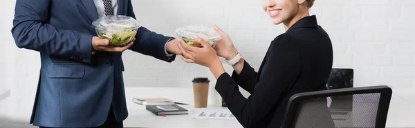 Cropped View Smiling Businesswoman Taking Plastic Bowl Food Worker While — Stock Photo, Image