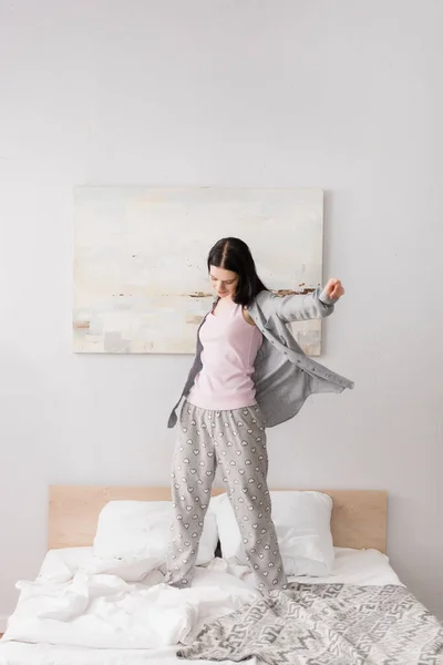 Full Length Happy Woman Vitiligo Stretching While Standing Bed — Stock Photo, Image