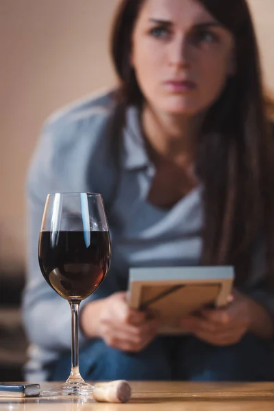 Lonely Alcohol Addicted Woman Holding Photo Frame While Sitting Glass — Stock Photo, Image