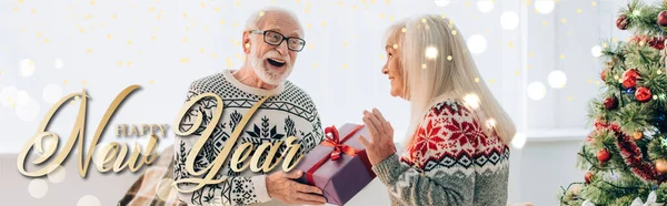 Excited Senior Man Presenting Christmas Gift Happy Wife Happy New — Stock Photo, Image