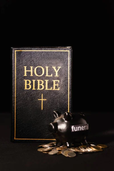 Piggy Bank Coins Holy Bible Black Background Funeral Concept — Stock Photo, Image