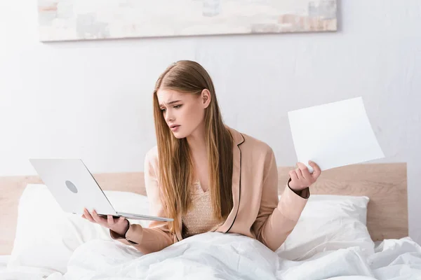 Upset Young Woman Silk Robe Holding Laptop Document Bedroom — Stock Photo, Image