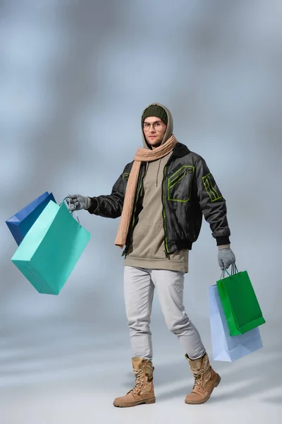 Full Length Stylish Man Winter Outfit Holding Shopping Bags Grey — Stock Photo, Image