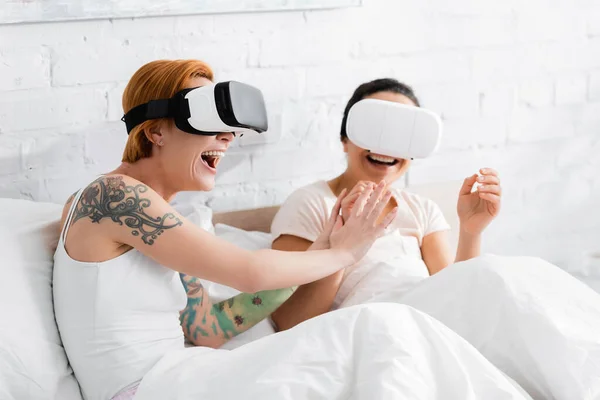 Excited Lesbian Woman Touching Hand African American Girlfriend While Having — Stock Photo, Image