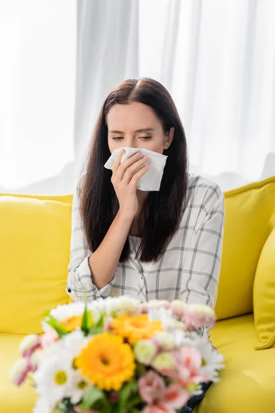 Allergic Woman Wiping Nose Paper Napkin Bouquet Blurred Foreground — Stock Photo, Image