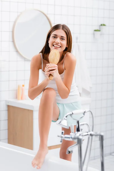 Cheerful Young Woman Looking Camera While Singing Hairbrush Bathroom Blurred — Stock Photo, Image