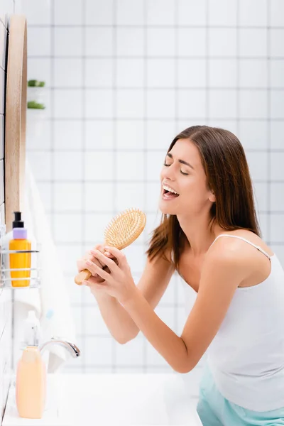 Excited Young Woman Singing Hairbrush Bathroom — Stock Photo, Image