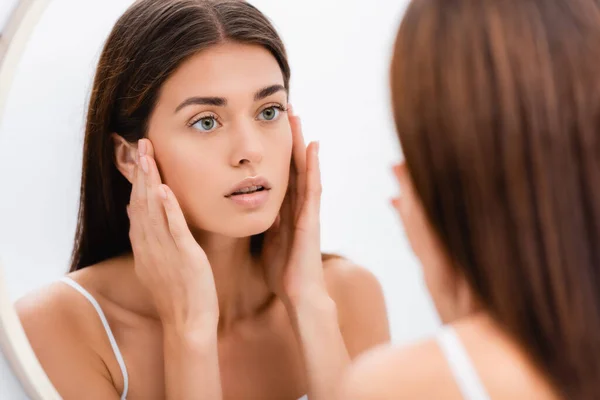 Young Woman Perfect Skin Touching Face While Looking Mirror Bathroom — Stock Photo, Image