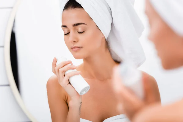 Young Woman Closed Eyes Smelling Deodorant Bathroom Blurred Foreground — Stock Photo, Image