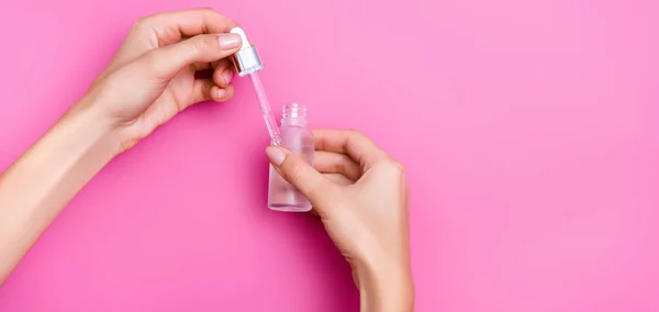 Partial View Woman Holding Dropper Bottle Cuticle Remover Pink Background — Stock Photo, Image