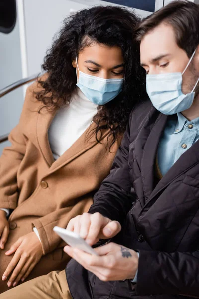 Man Medical Mask Using Smartphone African American Woman Subway — Stock Photo, Image