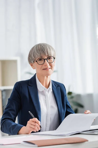 Happy Middle Aged Team Leader Glasses Signing Document Desk — Stock Photo, Image