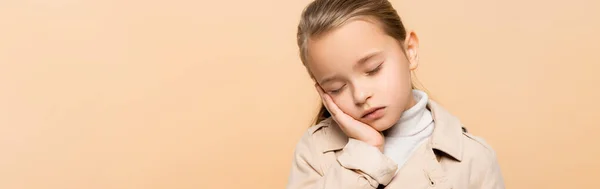 Sleepy Kid Closed Eyes Trench Coat Isolated Beige Banner — Stock Photo, Image