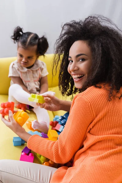 Happy African American Mother Playing Building Blocks Offended Toddler Kid — Stock Photo, Image