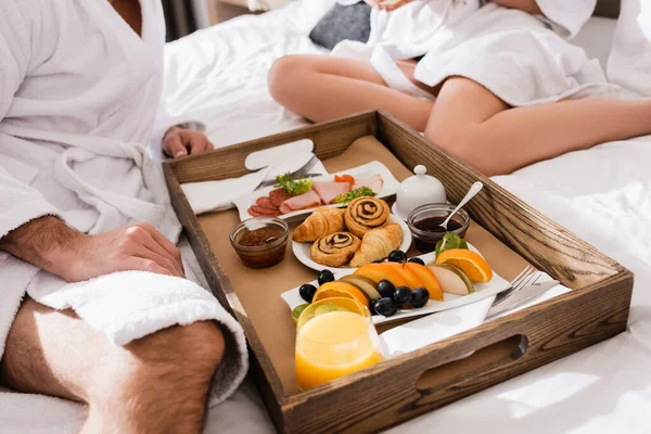 Cropped View Tasty Breakfast Orange Juice Tray Couple Bathrobes Hotel — Stock Photo, Image