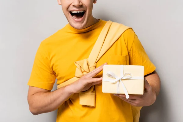 Cropped View Excited Man Holding Present Grey Background — Stock Photo, Image