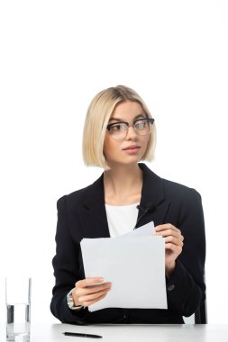 young blonde news presenter holding papers at workplace isolated on white clipart