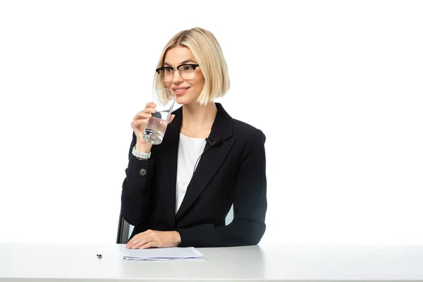 Smiling Blonde News Anchor Drinking Water Workplace Isolated White — Stock Photo, Image