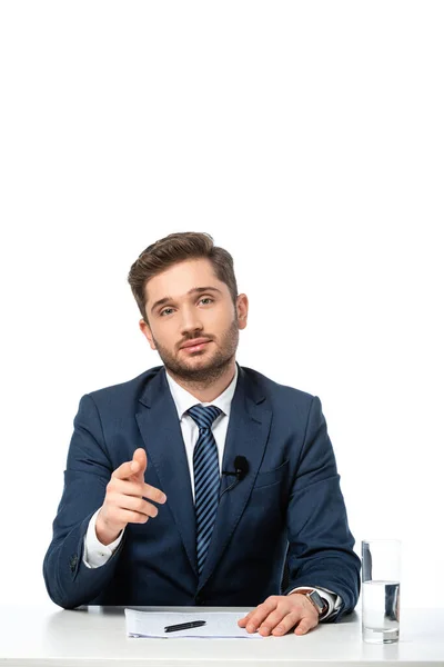 Young News Commentator Pointing Finger Papers Glass Water Isolated White — Stock Photo, Image