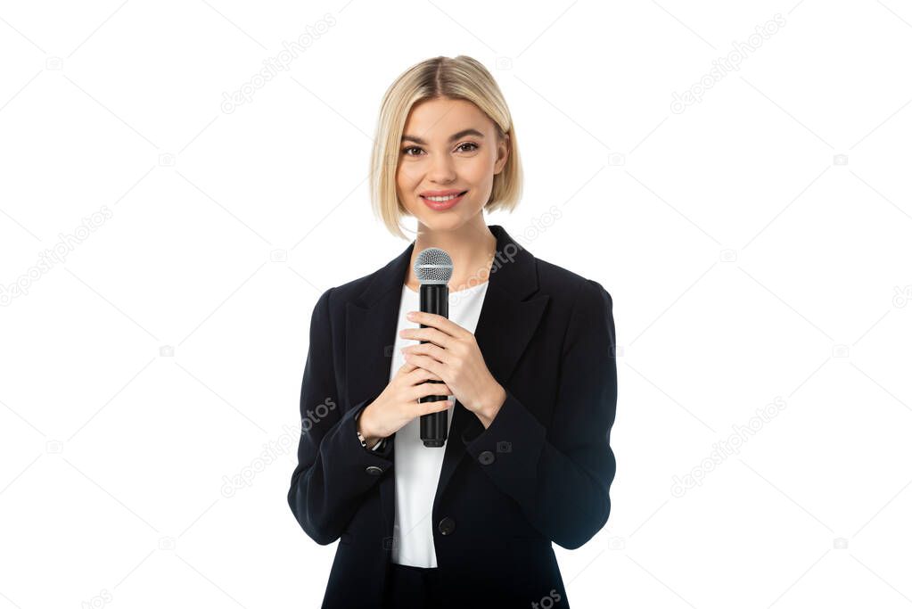 young blonde news presenter with microphone smiling at camera isolated on white