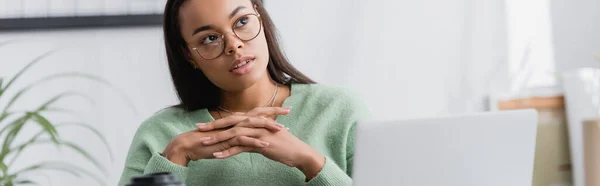 Thoughtful African American Freelancer Looking Away While Sitting Clenched Hands — Stock Photo, Image