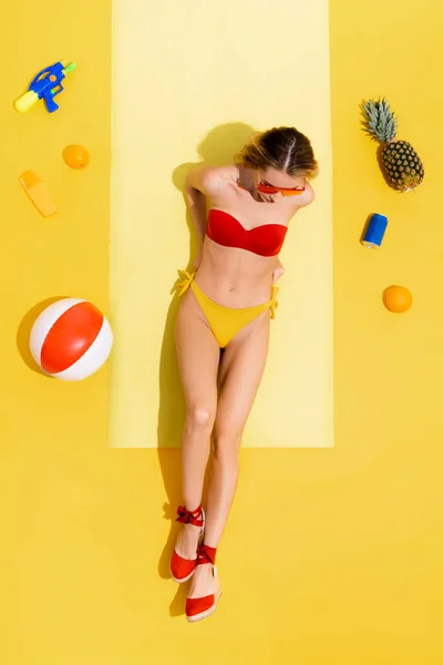 Top View Woman Resting Beach Mat Fruits Can Soda Sunscreen — Stock Photo, Image