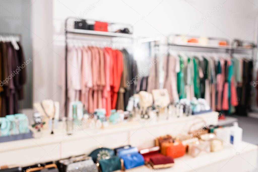 Blurred background of accessories in showroom with clothes 