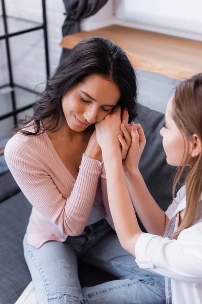 Happy Girlfriends Holding Hands Living Room — Stock Photo, Image