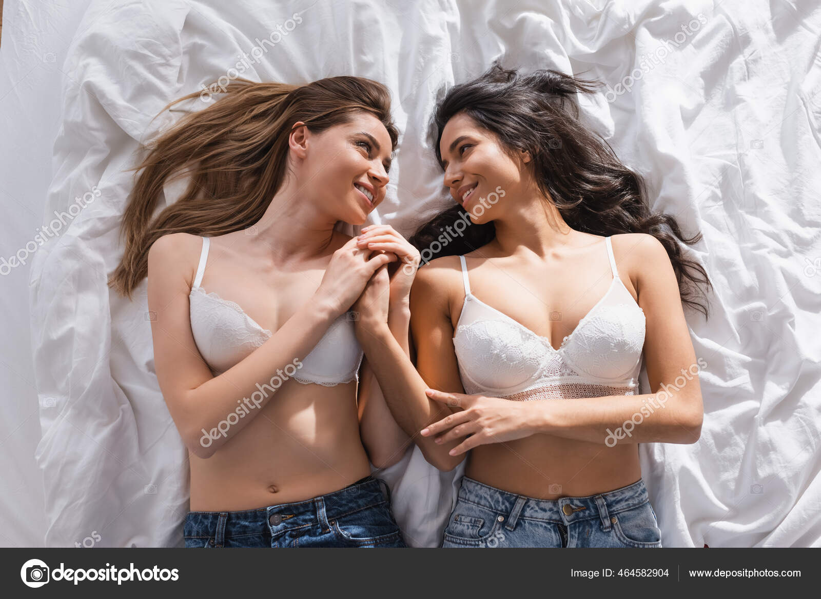 Top View Happy Lesbian Couple White Bras Hugging Bedroom Stock