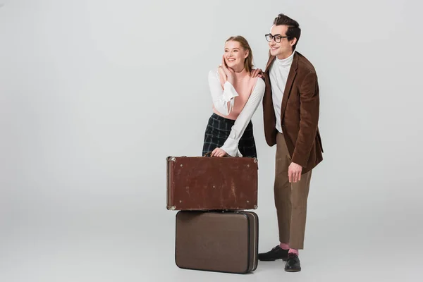 Joyful Couple Retro Outfit Looking Away Suitcases Grey Background — Stock Photo, Image