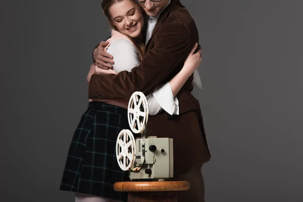 Happy Couple Embracing Vintage Film Projector Isolated Black — Stock Photo, Image