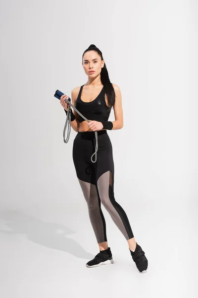 Full Length Young Sportive Woman Holding Skipping Rope Grey — Stock Photo, Image