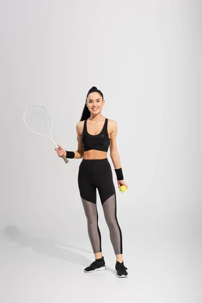 Full Length Joyful Sportswoman Holding Tennis Racket Ball Grey — Stock Photo, Image