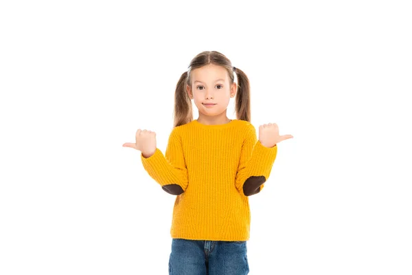 Confused kid pointing away while looking at camera isolated on white — Stock Photo