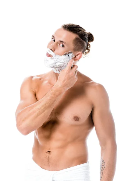 Sexy shirtless man with foam on face shaving isolated on white — Stock Photo