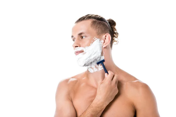 Sexy shirtless man with foam on face shaving isolated on white — Stock Photo