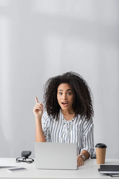 Amazed african american freelancer having idea while working from home — Stock Photo