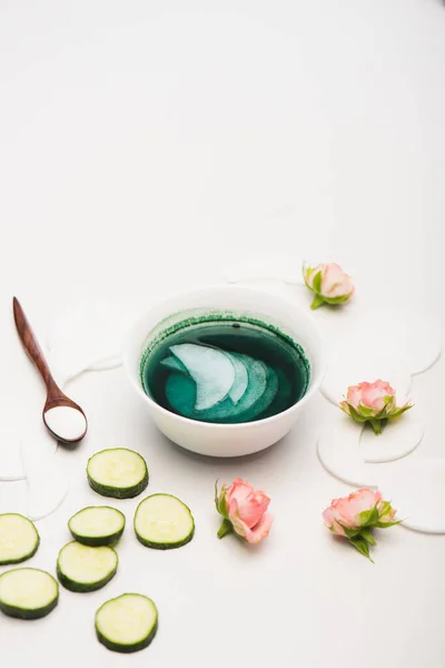 Bowl Tonic Cotton Pads Cucumber Slices Tea Roses Spoon Cosmetic — Stock Photo, Image