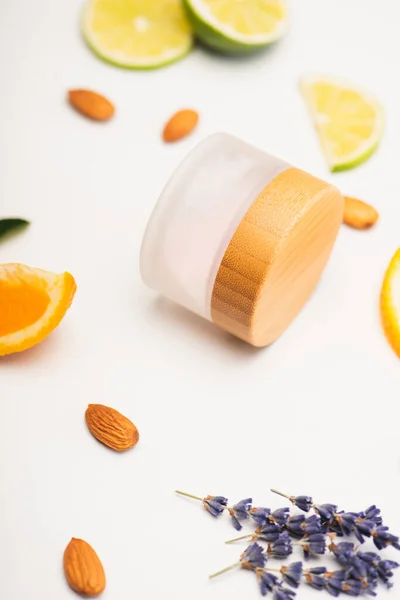 Container Homemade Cosmetic Cream Sliced Orange Lime Lemon Almonds Lavender — Stock Photo, Image