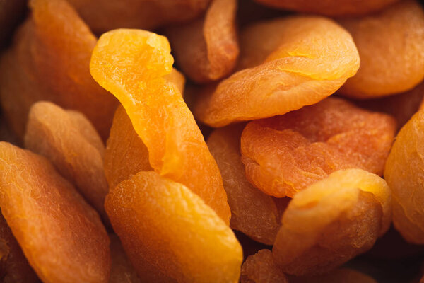 closeup of delicious dried apricots background