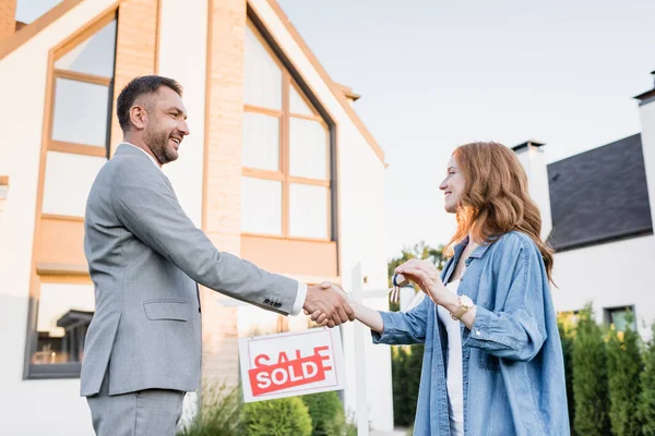 Side View Happy Broker Woman Keys Shaking Hands Sign Sold — Stock Photo, Image