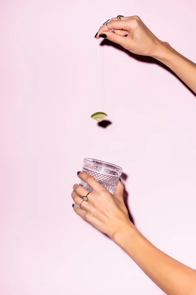 Cropped View Woman Holding Lime Glass Alcohol Drink Pink — Stock Photo, Image