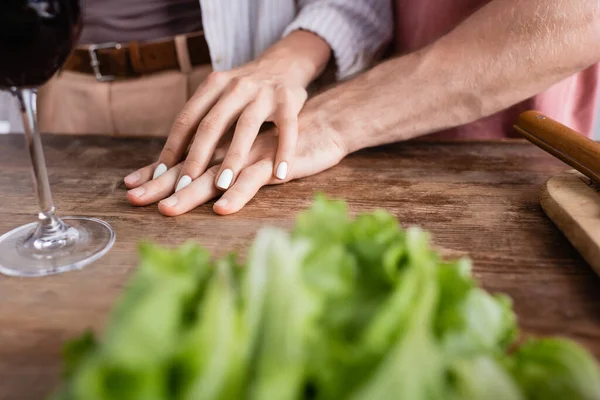 Cropped View Woman Touching Boyfriend Hand Glass Wine Lettuce Blurred — Stock Photo, Image