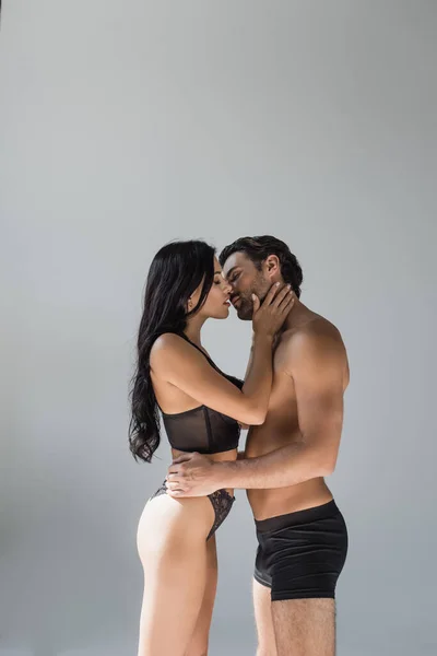 Sexy Woman Lingerie Kissing Man Panties Isolated Grey — Stock Photo, Image