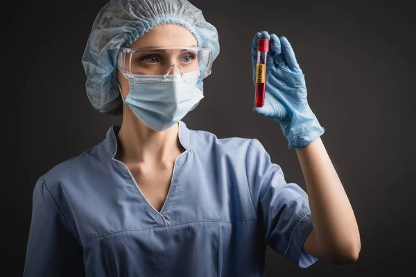 Nurse Medical Cap Mask Goggles Holding Test Tube Covid Lettering — Stock Photo, Image