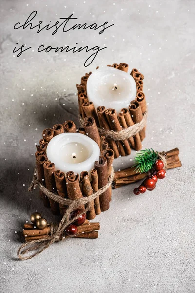 Scented Candles Decorated Cinnamon Sticks Christmas Coming Lettering Textured Grey — Stock Photo, Image